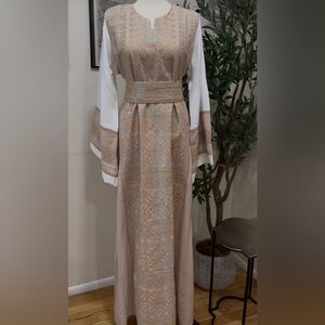 Embroidered Beige and Gold Dress machine made Thobe .